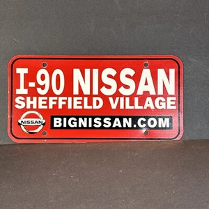 VINTAGE CAR AUTO ADVERTISING PLASTIC LICENSE PLATE I90 NISSAN SHEFFIELD VILLAGE - Picture 1 of 6