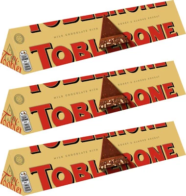 3 barras suizas de chocolate con leche TOBLERONE con turrón de miel y almendra 100 g 3,5 oz Foto 1 de 4