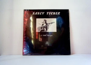 NANCY TUCKER LP A little stronger 1983 Collie Flower folk vinyl SEALED! - Imagen 1 de 1