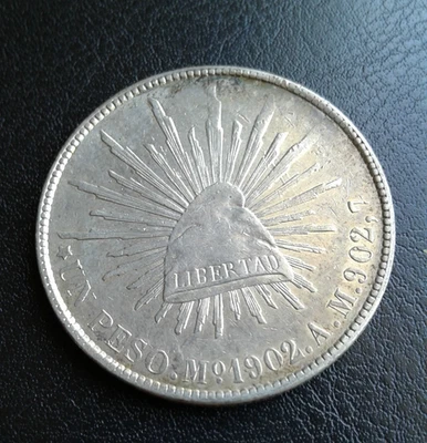 Foreign Silver Coins 1902 Mo.  Mexico - 1 Peso Cap & Rays - Silver - Image 1 of 4