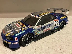 Minicar Autoart 1/18 Xanavi Hiroto Gtr R34 - Foto 1 di 6