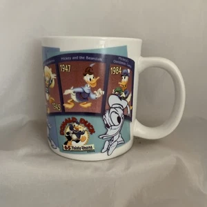 Taza de café The Walt Disney Gallery Donald Duck 65 años de lucha 1934-1999 usada - Imagen 1 de 6