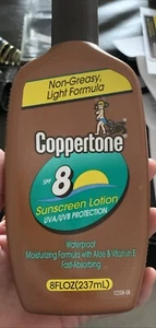 Botella marrón Coppertone SPF 8 loción bronceadora 8 oz utilería de película de colección - Imagen 1 de 1