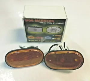 TWO UNIVERSAL OVAL AMBER SIDE MARKER TURN SIGNAL LIGHTS WITH 194 T-10 BULB ML-01 - Picture 1 of 2