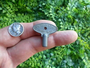 Vintage AUTOMATIC TOY COMPANY - wind up key - clock type - Picture 1 of 3