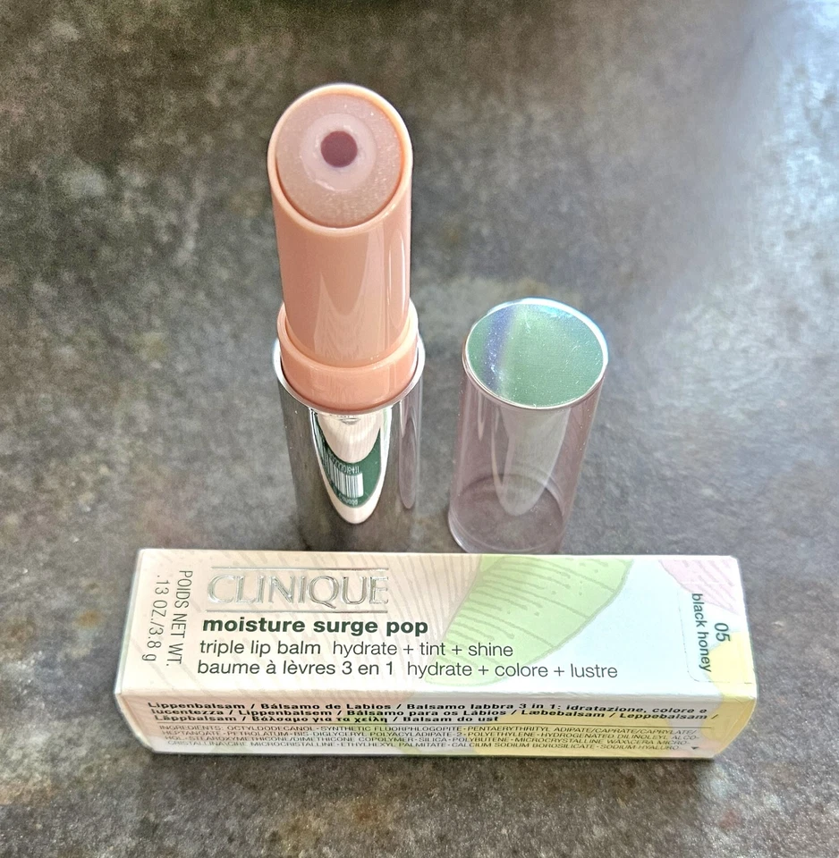 Bálsamo labial triplo Clinique BLACK HONEY 05 Moisture Surge Pop 0,13 oz DESCONTINUADO  - Imagem 1 de 1