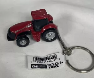 Portachiavi Tomy Ertl custodia rossa IH Magnum 380 nuovo con etichetta - Foto 1 di 12