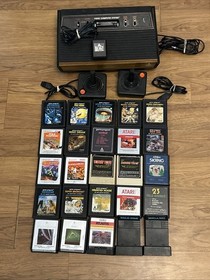 Atari 2600 Woodgrain 4 Switch Console w/ 25 Games 2 joysticks Tested Working