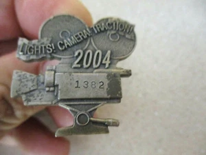 2004 lights camera traction 1382 Indianapolis Speedway movie camera lapel pin - Picture 1 of 2