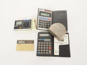 Lot 4  Vintage Pocket Calculators World Time Casio Royal Sharp Tested Works - Picture 1 of 6