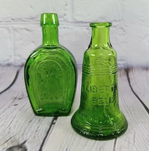 Wheaton 2 Vintage Miniature Glass Bottles Green Liberty Bell & Horseshoe - Picture 1 of 16