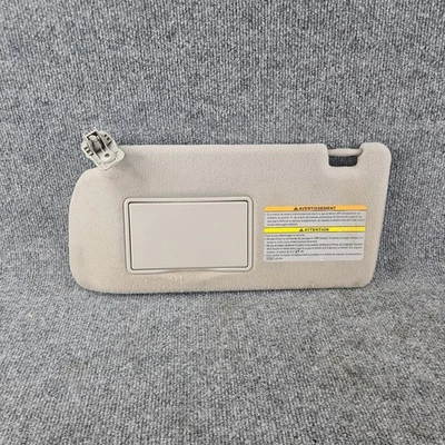 2005-2012 Nissan Xterra Frontier Pathfinder Driver Sun visor Gray Cloth - Image 1 of 4