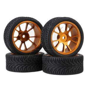 4 pezzi pelle gomma pneumatici lega di alluminio ruota dorata per auto RC1:10 su strada - Foto 1 di 6