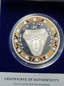 NIUE 2013 1 DOLLAR SILVER PLATED SNAKE BITE COIN w/CASE+COA - Picture 1 of 4