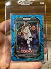 2022-23 Prizm Basketball Monopoly Giannis Antetokounmpo No. 49 Teal Wave