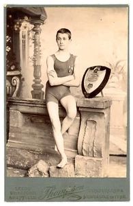 1890 DATED: SWIMMING CHAMPION WITH AWARD - SUPERB VICTORIAN SPORTS ITEM - Picture 1 of 2
