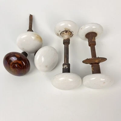 Lot of 7 Vintage Doorknobs Handles 1 Brown Swirl 6 White Porcelain Marble? - Image 1 of 4