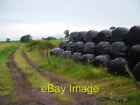 Photo 6x4 Round bales, Whirreston Boquhapple Silage stored away beside a  c2006