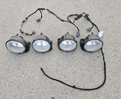 Juego de 4 carcasas de luces de techo Hella todoterreno Jeep Liberty Renegade 2002-2007 OEM Foto 1 de 4