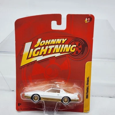 UH 2010 Johnny Lightning Forever 64 JL7 1984 Pontiac Firebird White Gold Sealed - Image 1 of 4