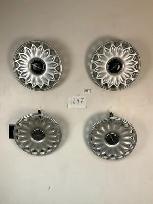Tapacubos cubierta de rueda de 14" Plymouth Voyager Acclaim Sundance 1994-1995 OEM 4 Foto 1 de 4