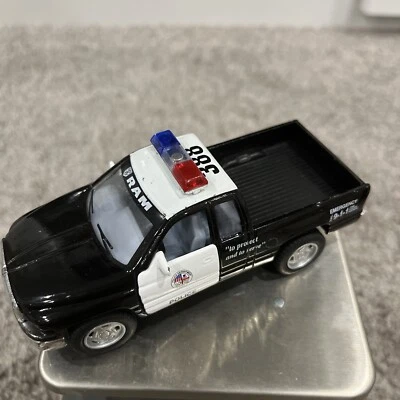 道奇 Ram 1500 4X4 警察皮卡车 911 紧急摩擦拉回,Kinsmart — 第 1/4 张图片