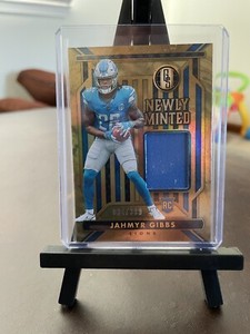 2023 Panini Gold Standard, Jahmyr Gibbs RC Newly Minted Patch /399 Lions