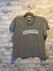 Nike Georgia Girls V Neck Grey Shirt Sleeve T Shirt Size Large Age 13-14 Years - Picture 1 of 3