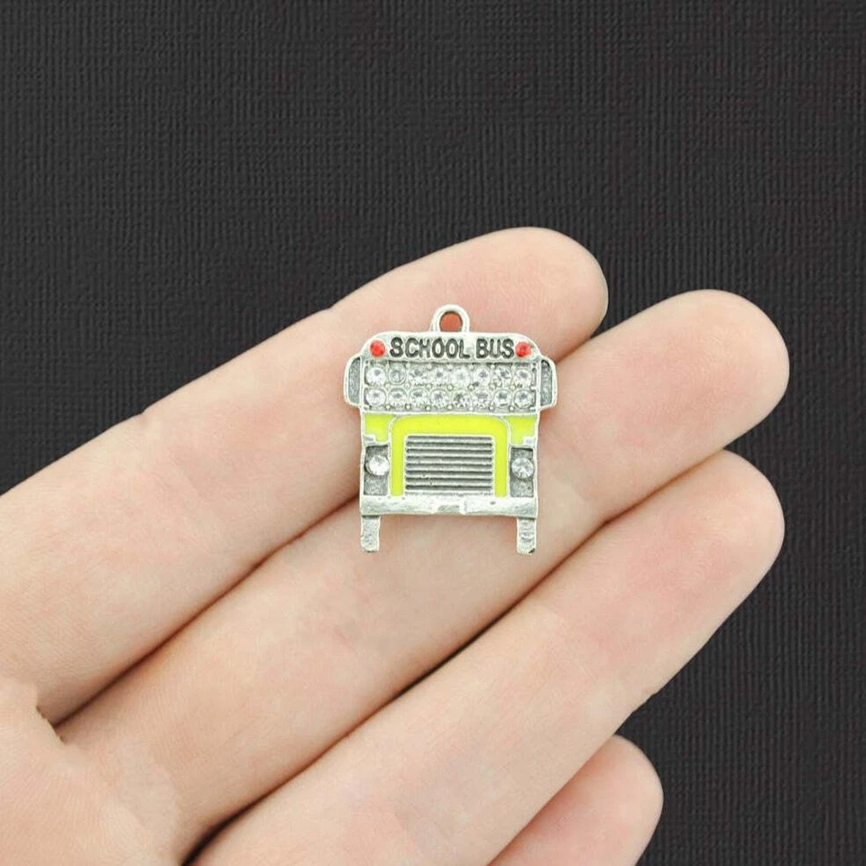 Dijes de esmalte amarillo para autobús escolar tono plateado con pedrería insertada - E973 Foto 1 de 1