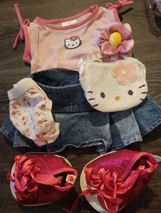 BAB Hello Kittty Top, Unterhose, Schleife, Handtasche. 1 Jeansrock, hohe Schuhe, Paket 7 - Bild 1 von 9