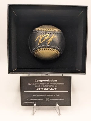2025 Fanatics Under Wraps Signed Baseballs Vol. I - Kris Bryant - Black and Gold - Image 1 of 4