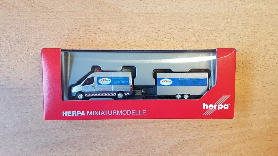 Herpa 095068 - 1/87 VW Crafter Scatola Tetto Alto Con Tandem-Koffer-Anh. " Saba - Immagine 1 di 1
