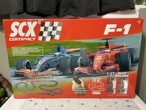 SCX Compact 1:43 Slot Racing Ferrari F2007 & Mercedes MP4-22 - New - Sealed! - Picture 1 of 12