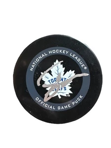 JOHN TAVARES AUTOGRAPH SIGNED NHL HOCKEY GAME PUCK TORONTO MAPLE LEAFS - Picture 1 of 2