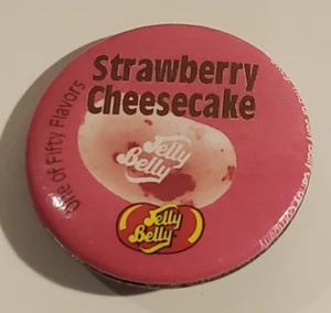 VTG 1980s JELLY BELLY BEAN CANDY FLAVOR PINBACK BUTTON PIN STRAWBERRY CHEESECAKE - Picture 1 of 2