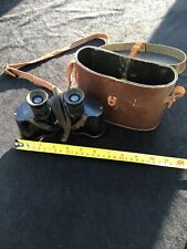 VINTAGE  WW1 BINOCULARS WITH LEATHER CARRYING STRAP IN LEATHER CASE. DATED 1918