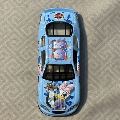 NASCAR Disney Team Caliber 2004 Daytona 500 Daisey Duck Race Car 1:64 Loose  - Image 1 of 4
