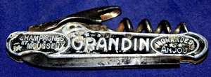 ANCIEN COUTEAU PLIANT PUBLICITAIRE CHAMPAGNE GRANDIN TIRE BOUCHON - Imagen 1 de 5