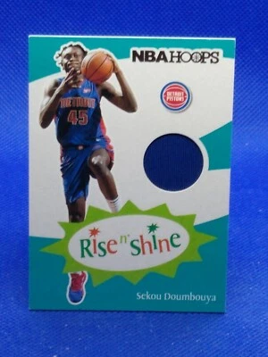 2019 Panini NBA Hoops Rise N Shine Memorabilia Sekou Doumbouya #RS-SKD Rookie RC - Image 1 of 2