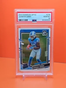 🔵🦁⚪️ 2023 DONRUSS OPTIC JAHMYR GIBBS #236 CLASIFICACIÓN NOVATO PSA 10 💎 COMO NUEVO ⚪️🦁🔵 - Imagen 1 de 2