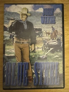 Blue Steel.   John Wayne - Picture 1 of 2