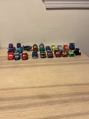 Lot of 20 Disney Pixar Cars Cars 2 Movie Diecast Trucks Blimp - Image 1 of 4