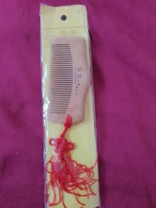 ladies comb, New in Original pack, red tassell on comb - Picture 1 of 1