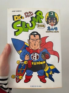 Dr. SLUMP TORIYAMA AKIRA FUMETTO ART BOOK raro AUTOGRAFO prima stampa 2006 VOL.3 - Foto 1 di 7