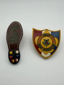 Set of 2 BSA Neal Neckerchief Slides Hiker of the Schiff Trails & Shield SS-574 - Picture 1 of 7