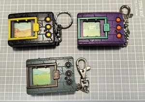 Bandai Digimon Digital Monster 3 Stück Set Clear Black Yellow Purple Green - Bild 1 von 10