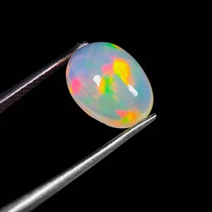 Ópalo etíope natural de 2,25 quilates Welo ópalo de fuego 11x8x5 mm piedra preciosa suelta ovalada - Imagen 1 de 3