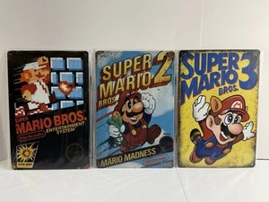 Super Mario Bros Metal Tin Signs / Posters Lot Game Room Man-cave Nintendo NES - Picture 1 of 4