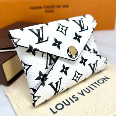 Louis Vuitton Monogram Giant Pochette Kirigami 3.8*2.7*0.7 inch - Image 1 of 4