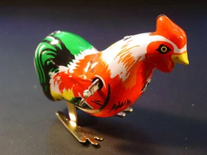Blechspielzeug hüpfender Hahn NEU , OVP - Bild 1 von 2